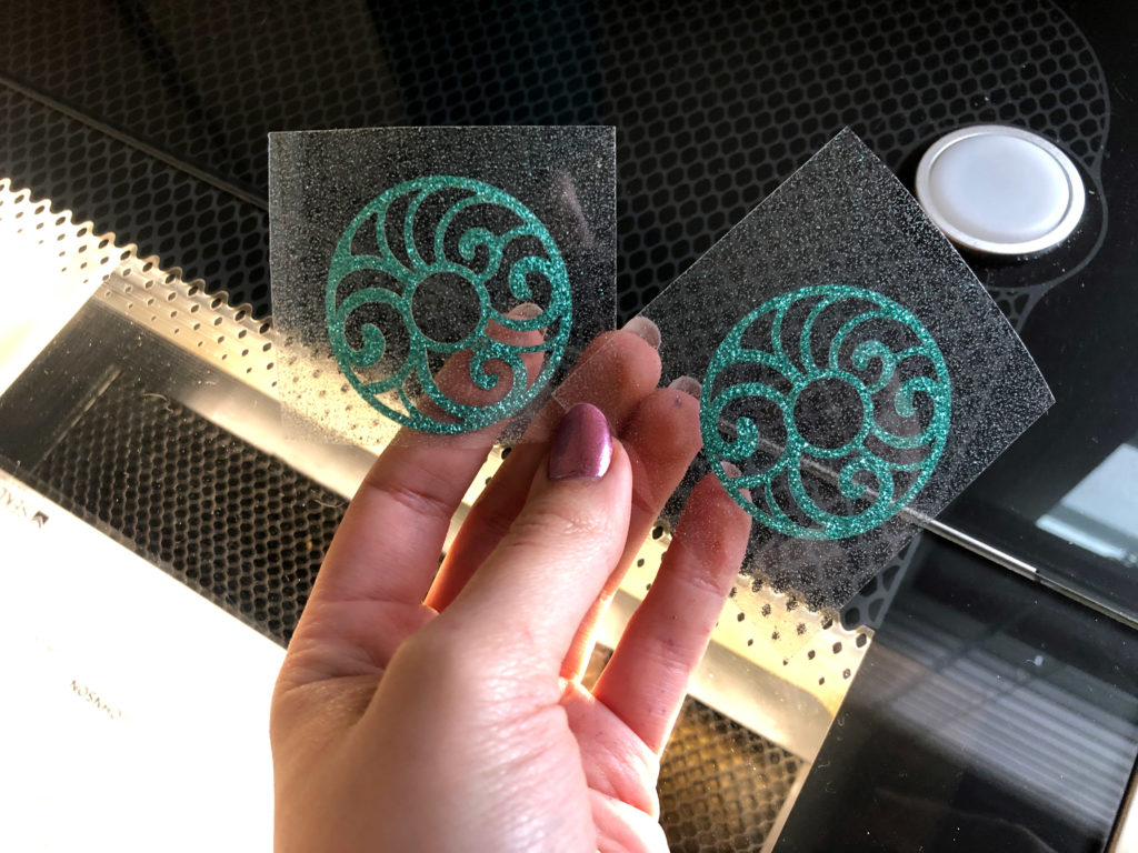 First time trying to do an inlay design by laser engraving the coaster and  then laser cutting the veneer. Not perfect, but given the 6 failed attempts  not in the picture, I'm
